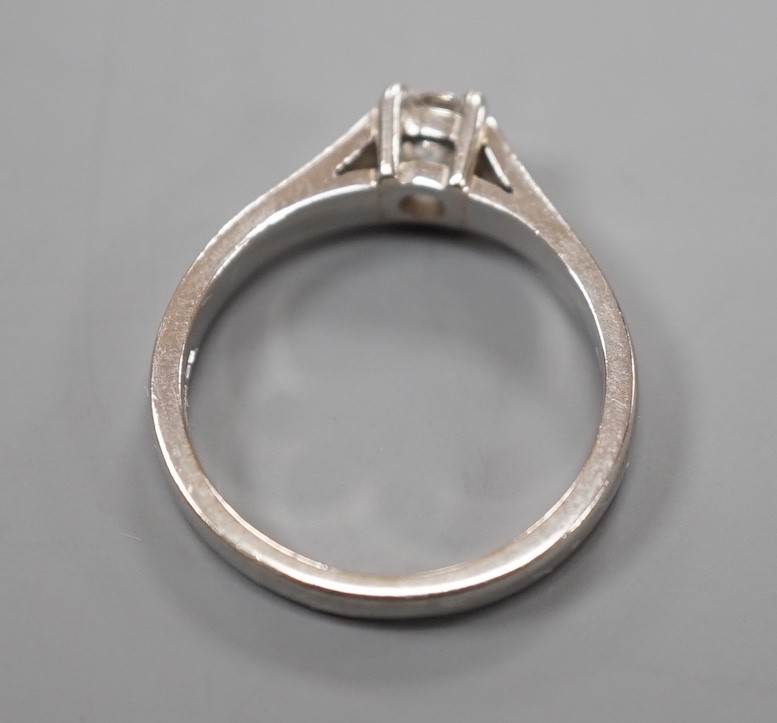A modern platinum and solitaire diamond ring, size M, gross weight 5.2 grams